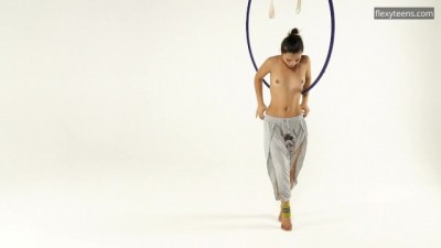 Brunette Bombshell in Yellow Socks Gets Wild with Acrobatics
