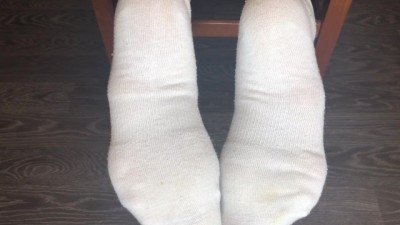 Naughty Student Teases with Bare Feet and White Socks Post-Study Session